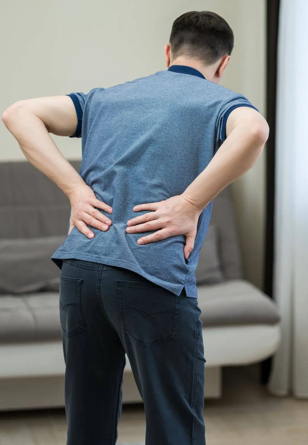 Man experiencing back pain