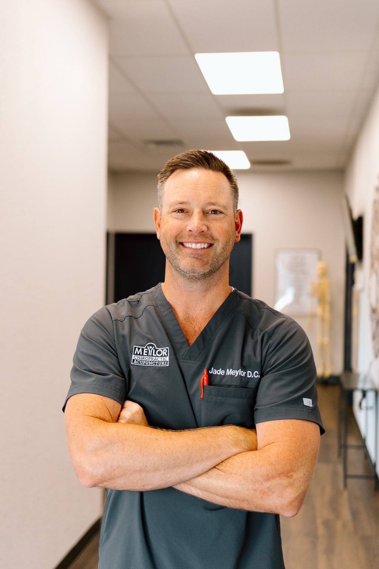 Overland Park chiropractor Dr. Meylor performing spinal adjustment for back pain relief