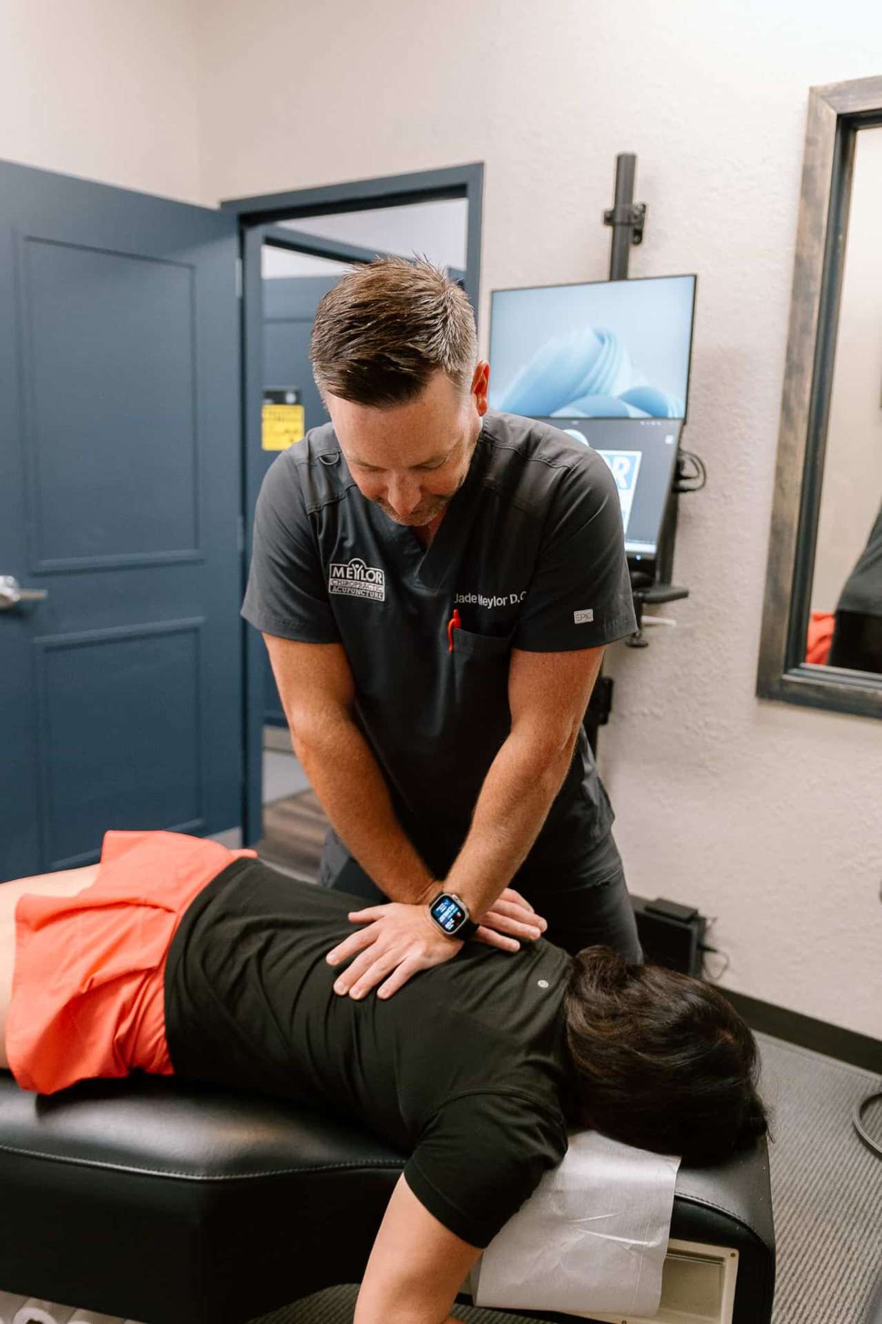 Dr. Meylor providing spinal treatment