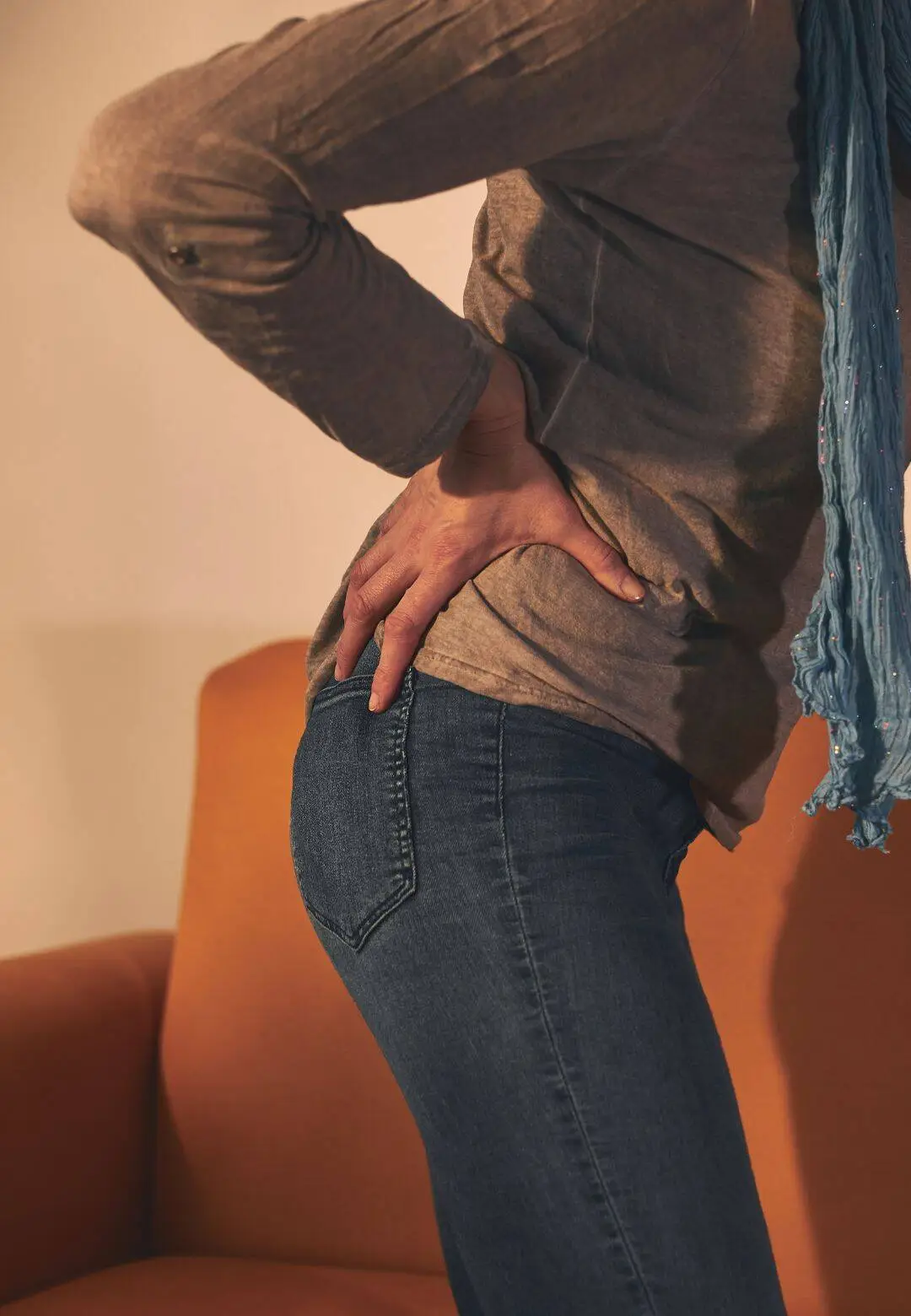 Woman experiencing lower back pain