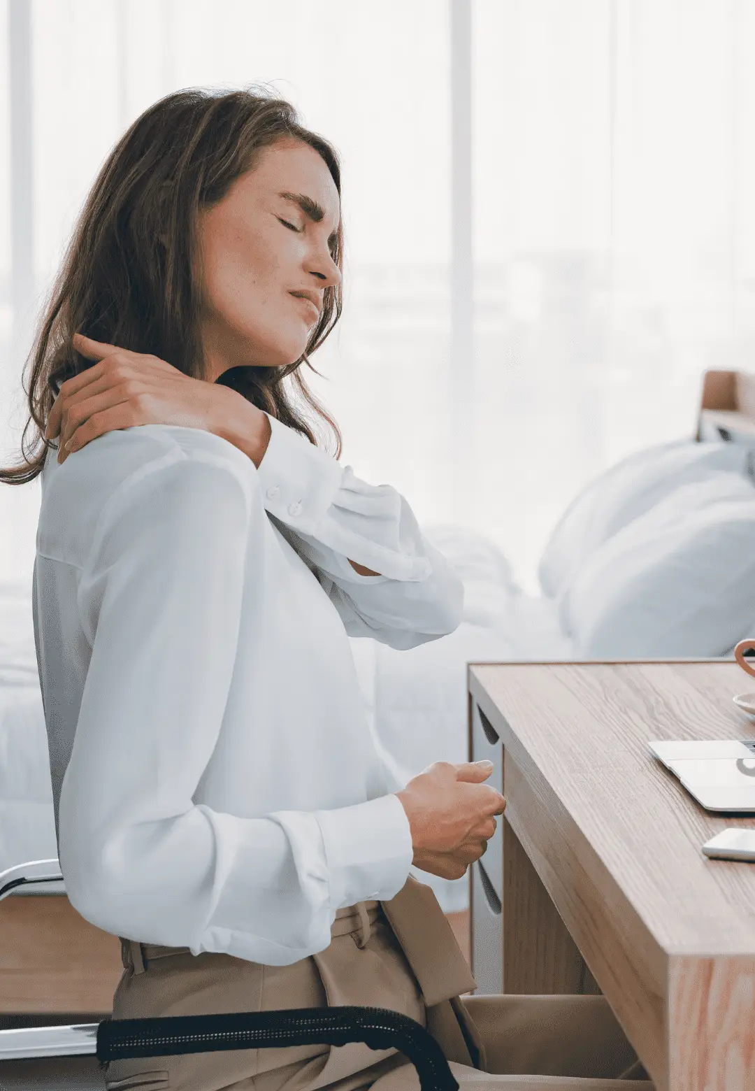 Lenexa office worker with neck pain from poor posture needing chiropractic treatment